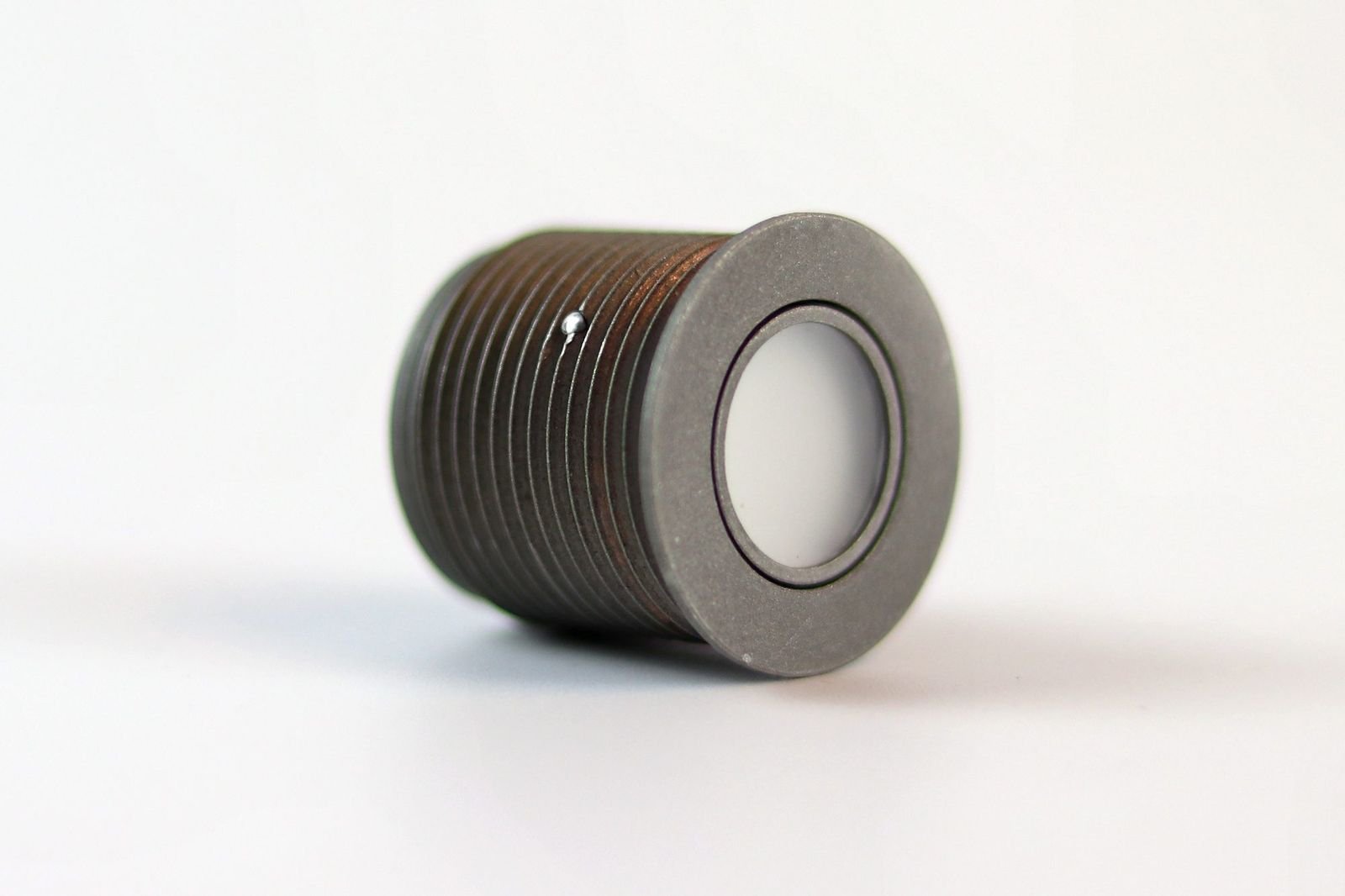 HABI Button, a threaded metal button module with a white lens