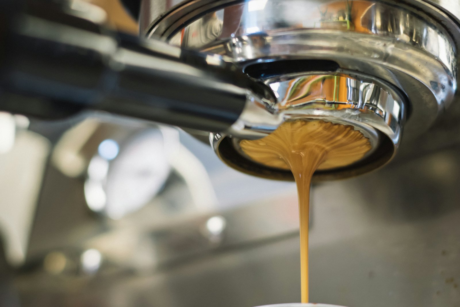 Coffee pouring from an espresso machine