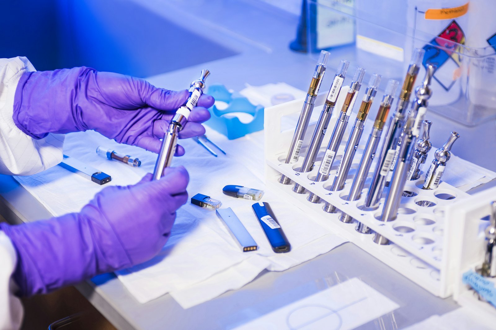 Lab work with samples and purple nitrile gloves