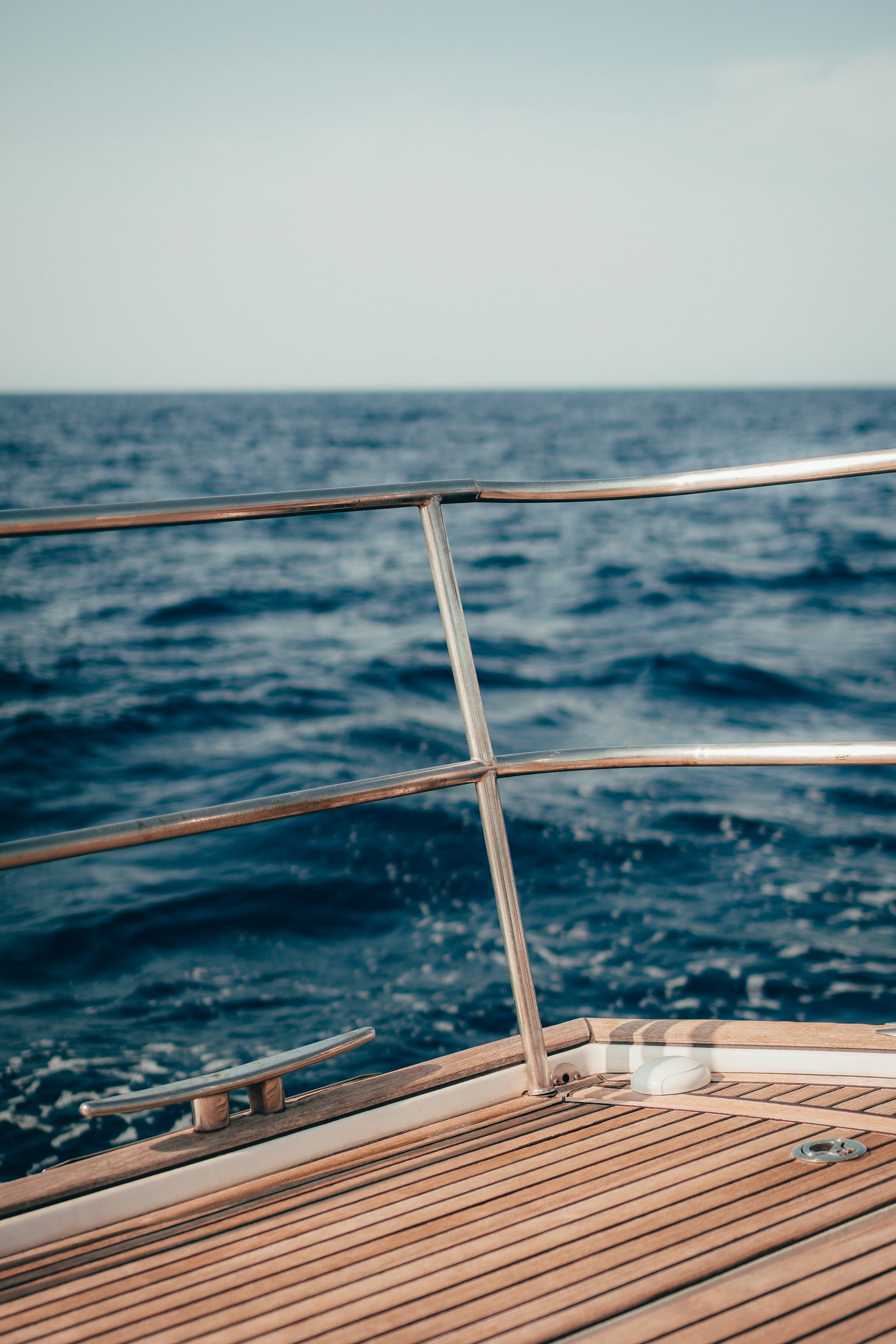 Ship railing above rough sea