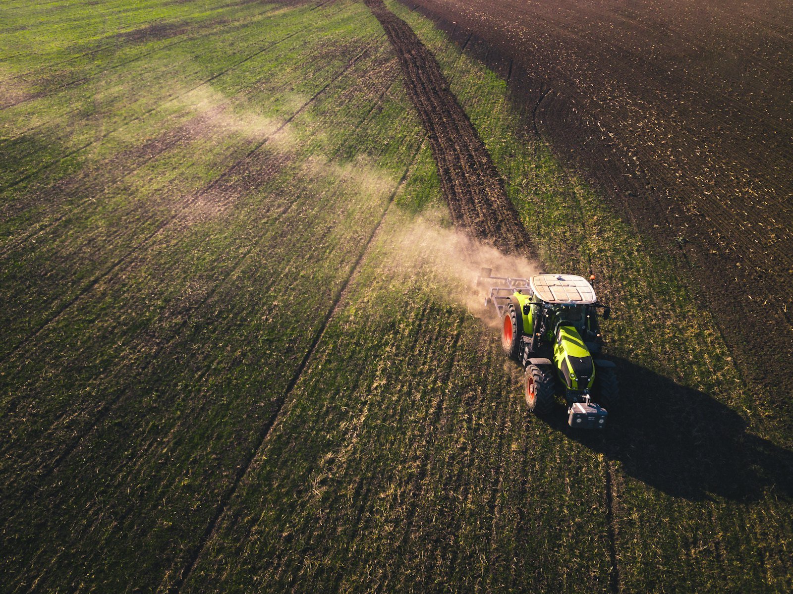 Tractor working a field, seen from above