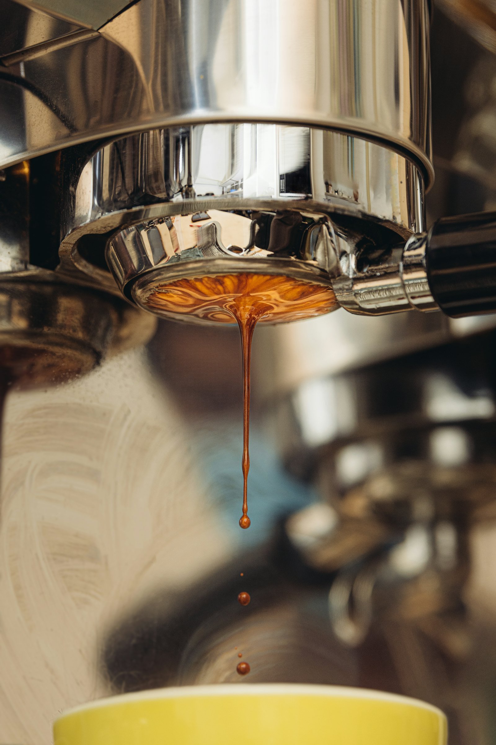 Espresso pouring from a portafilter